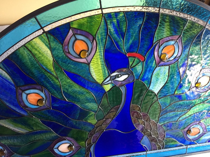 Peacock feather delight glass window