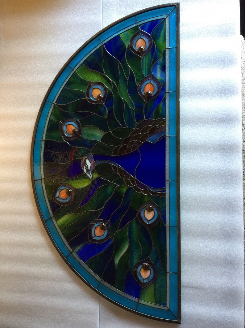 Peacock feather delight glass window