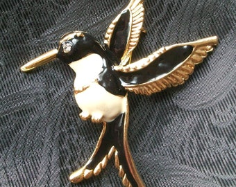 Beautiful hummingbird brooch black enamelled with rhinestone stone as eye vintage brooch