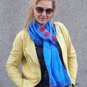 Nuno felted silk scarf,  a bright blue scarf made of silk and wool with autumn leaves.
