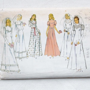 May include: A vintage sewing pattern envelope showing illustrations of five bridal gowns. The designs include long sleeves, veils, and floral details. The envelope is marked with the number 4500 and the word "Style".