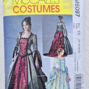 May include: A McCall's Costumes sewing pattern envelope M6097 for sizes EE (14-16-18-20). The front displays illustrations of two long gowns with long sleeves, square necklines, and decorative trim. One gown is grey and magenta, the other is light blue.