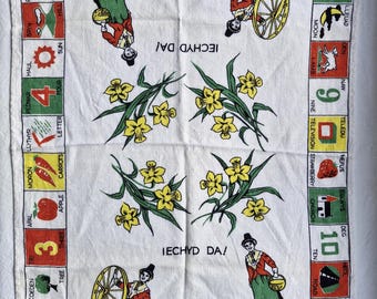Welsh words and pictures vintage tea towel, IECHYD DA and daffodils
