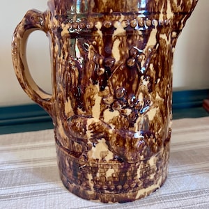 Vintage Rockingham Bennington Pottery Pitcher with Peacock and Palm Trees Raised Mottled Yellow Ware Rustic Farmhouse Kitchen Cottagecore