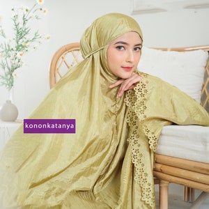 Enchanting Elegance Mukena Parasut 2in1 Lasercut Unveiling the Beauty of Tradition