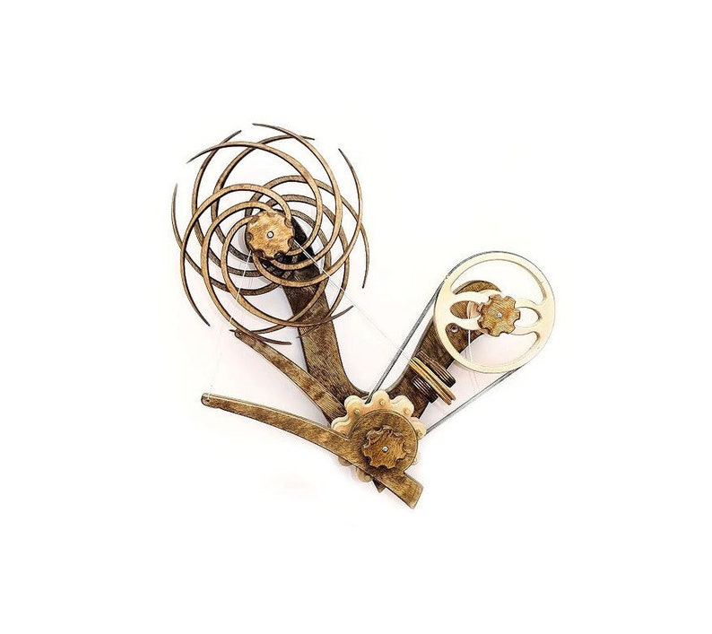 May include: A wooden kinetic sculpture with a spiral design and a belt-driven gear system. The sculpture is made of light brown wood and has a gold finish.