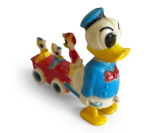 Trotteur vintage Donald Duck avec des canetons, jouet rétro en plastique de collection Walt Disney