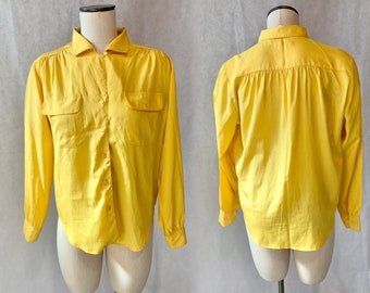 canary yellow blouse