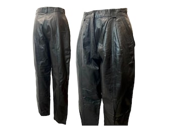 Pantalones cónicos plisados de cintura alta de cuero negro de los años 80 / cintura 29"