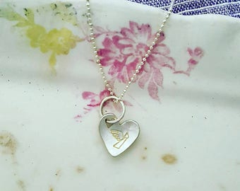 Necklace silver heart charm with an angel stamp on the front & kisses on the back x Handmade gift perfect gift for a loved one. x