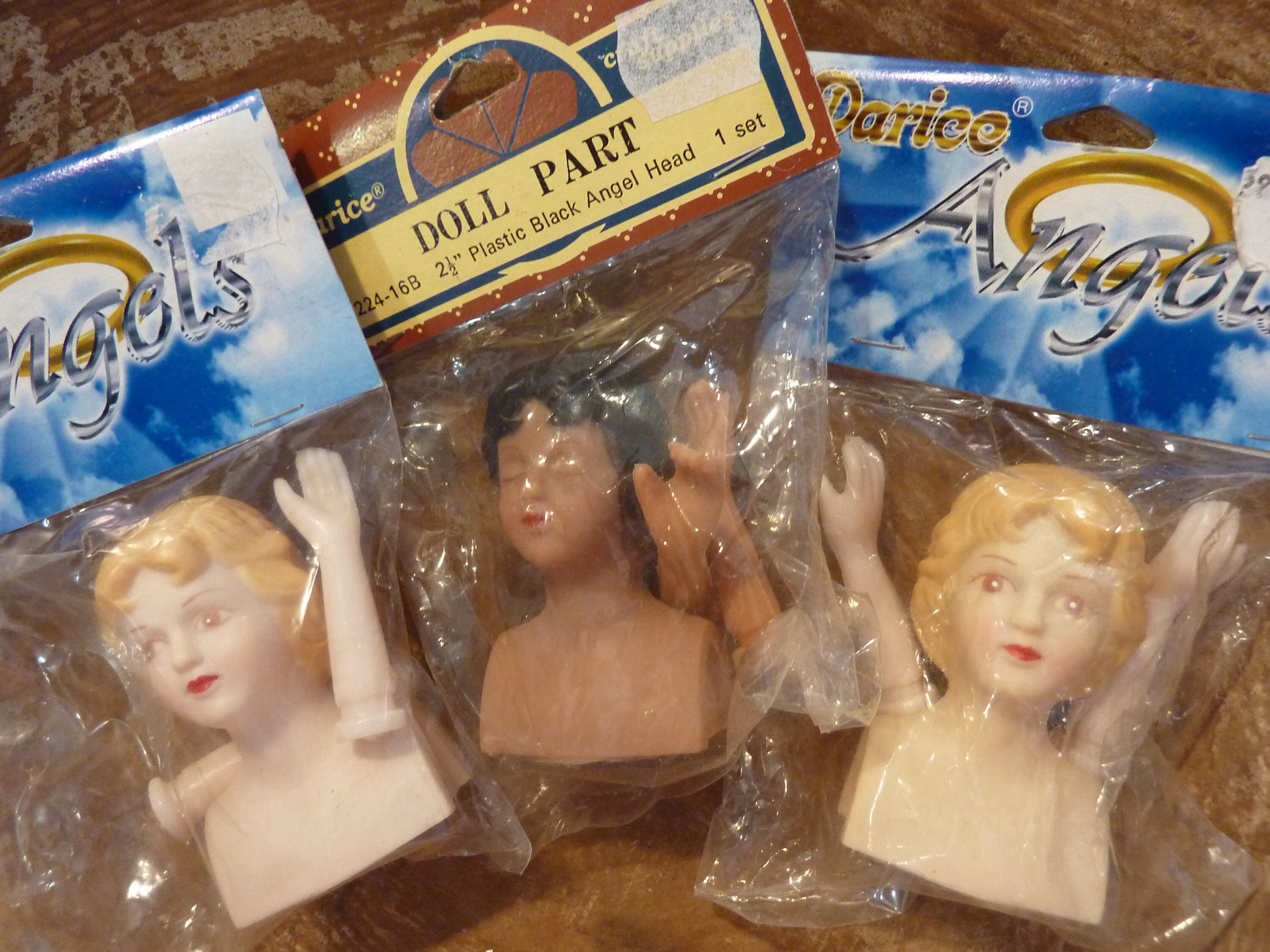 2 Pairs of female doll hands with fore-arm