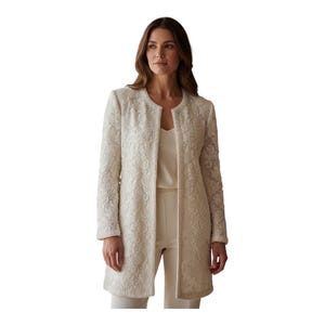 May include: An ivory-colored, long-sleeved coat with an open front. The coat features an intricate floral pattern and is worn over a matching outfit. The coat's design includes a round neckline and a knee-length hemline.