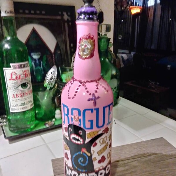 VOODOO DOUGHNUT Rogue Mojo Altar Bottle Sealed. Bottle Art. Crystal Ball Topper. Wanga. Charm. Hoodoo. Pink with cross and beads. Loa.