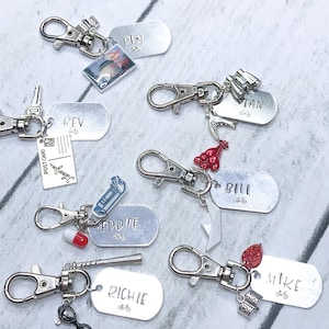 Llaveros o etiquetas para collares del Club de los Perdedores