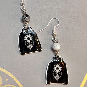 Pendientes con capucha Eclipse