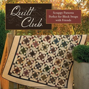 May include: A book titled "Quilt Club" with a scrappy quilt pattern on the cover. The book is about scrappy patterns perfect for block swaps with friends. The book is by Paula Barnes and Mary Ellen Robison of Red Crinoline Quilts.
