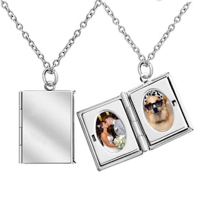 Könnte beinhalten: Silberne Halskette mit Anhänger, der sich öffnen lässt. Eine Seite bietet Platz für ein Foto, die andere Seite zeigt ein Foto eines Hundes mit Sonnenbrille.