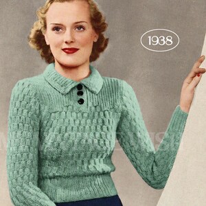 May include: A light mint green long-sleeve knit sweater with a textured pattern, a collared neckline, and three black buttons. The sweater features a ribbed waist and cuffs, with the text 1938 and Designed to fit a 34" bust printed on the image.
