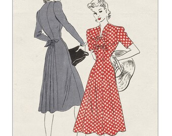 Puede incluir: Ilustración de patrón de costura vintage con dos mujeres vistiendo vestidos. La mujer de la izquierda lleva un vestido gris con un lazo en la cintura. La mujer de la derecha lleva un vestido rojo con lunares blancos. El número del patrón es 8573, con una talla de pecho de 81 cm y una talla de cadera de 89 cm.