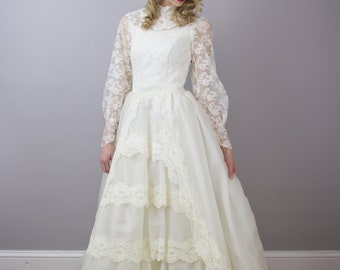 Vintage 1950's princess style tiered wedding gown / illusion high neckline / long sleeves / xs 00