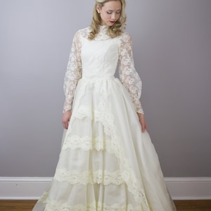 Vintage 1950&#39;s princess style tiered wedding gown / illusion high neckline / long sleeves / xs 00