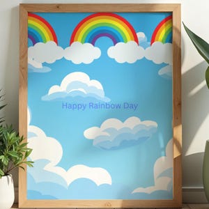 Pode incluir: Uma impressão emoldurada com um fundo de céu azul claro, nuvens brancas e vários arco-íris coloridos. O texto "Happy Rainbow Day" está impresso no centro da imagem. A obra de arte está dentro de uma moldura de madeira de cor clara.