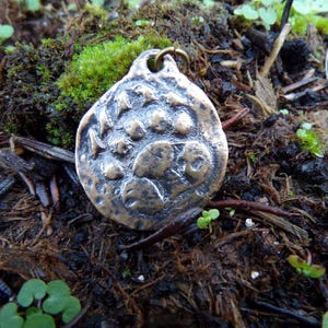 Bronzen berenpoothanger