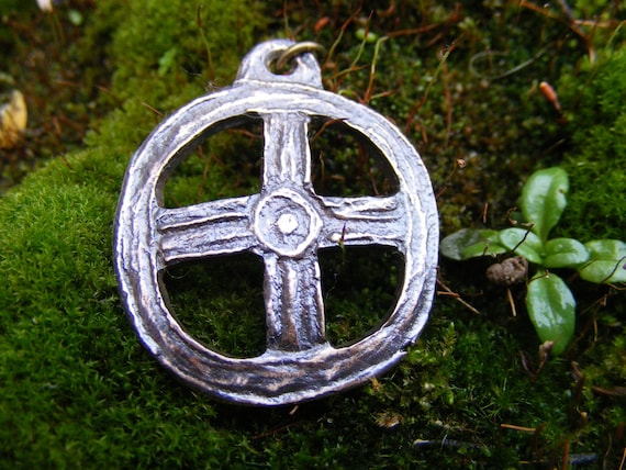 Sun cross pendant deals