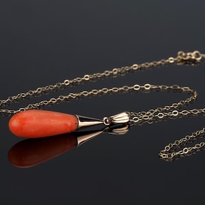Antique Coral pendant necklace; 9ct gold drop pendant on 9ct gold chain