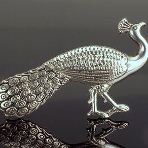 Silver peacock brooch pin. Large with lots of engraved detail.