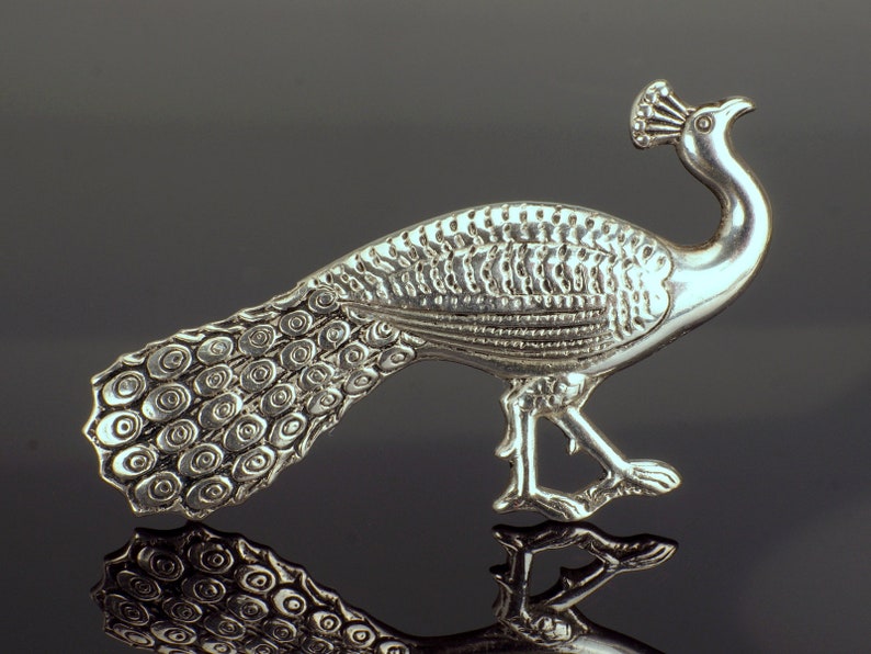 Silver peacock brooch pin. Large with lots of engraved detail.