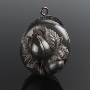 Vulcanite Mourning locket, Antique Victorian pendant with three dimensional fruit and leaf decoration, high relief black memorial locket