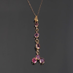 Antique Victorian gold ruby riviere pendant on 9ct gold chain; untreated natural Rubies - 3.24cts