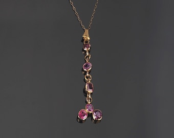 Antique ruby necklace; pendant on 9ct gold chain; natural Rubies