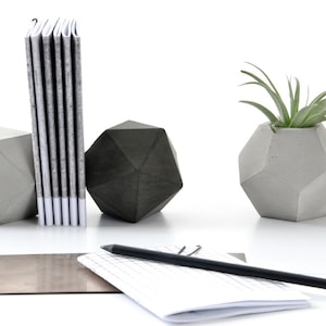 grey icosahedron sculpture bookend