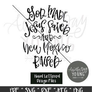 May include: Black and white hand-lettered design with the text "God Made, Jesus Saved, and New Mexico Raised". The design also includes the text "Hand Lettered Design Files" and "Another Day Young" with an arrow.