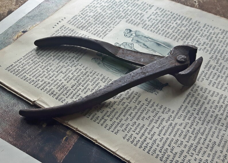 Antique Pliers made by blacksmith horse harness nail