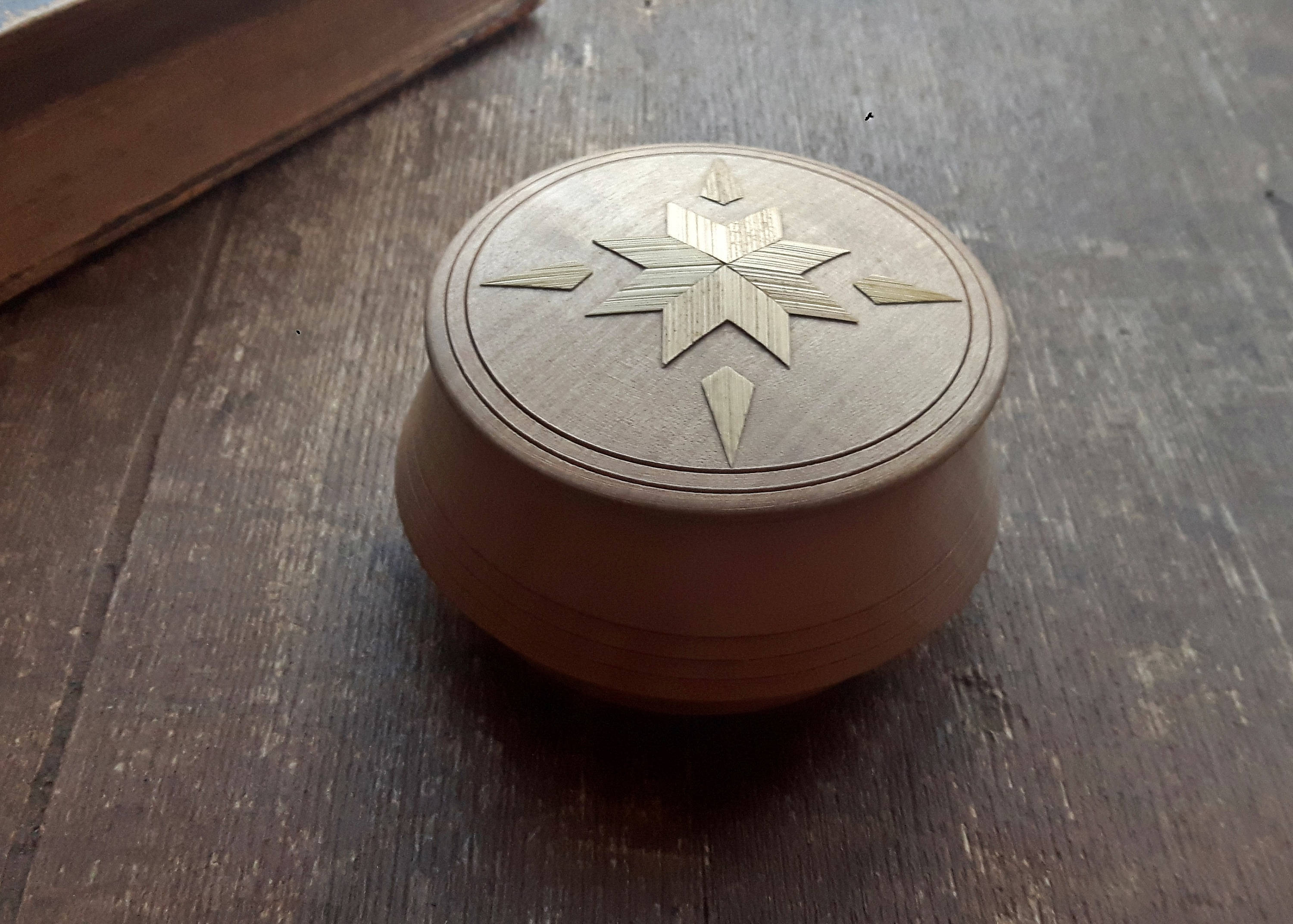 small round wooden box