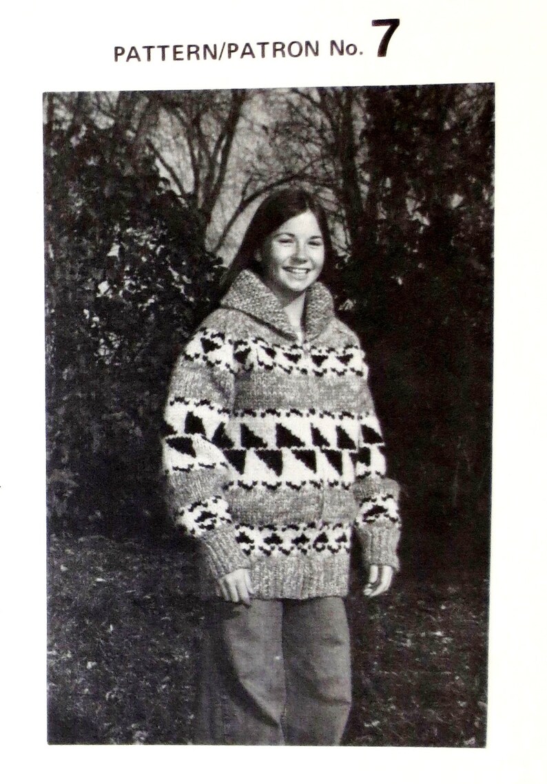 May include: A black and white knitted sweater with a geometric pattern. PATTERN/PATRON No. 7 is printed at the top of the image.