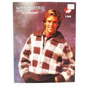 May include: A vintage pattern cover featuring a man wearing a brown, white, and cream checkered jacket. The jacket has a brown collar and cuffs. The text on the cover reads "WHITE BUFFALO" and "HIS OR HER JACKET".