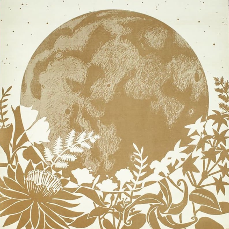 May include: A brown and white print of a full moon with white silhouettes of plants and flowers surrounding it.