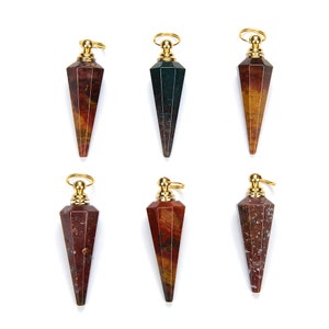 May include: Six gold-capped, faceted, gemstone pendants in various shades of red, brown, and green. The pendants are shaped like a pointed teardrop.