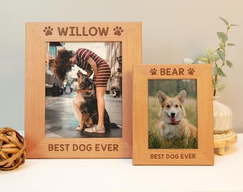 May include: Two wooden photo frames with paw prints and the text "Best Dog Ever". The left frame has a photo of a woman with a dog, and the frame is labeled "Willow". The right frame has a photo of a dog and is labeled "Bear".
