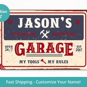 May include: A vintage-style metal sign with a distressed look. It says "Jason's Garage" in red letters with a hammer and wrench symbol. The sign also says "Open 24/7" and "Est 2017".