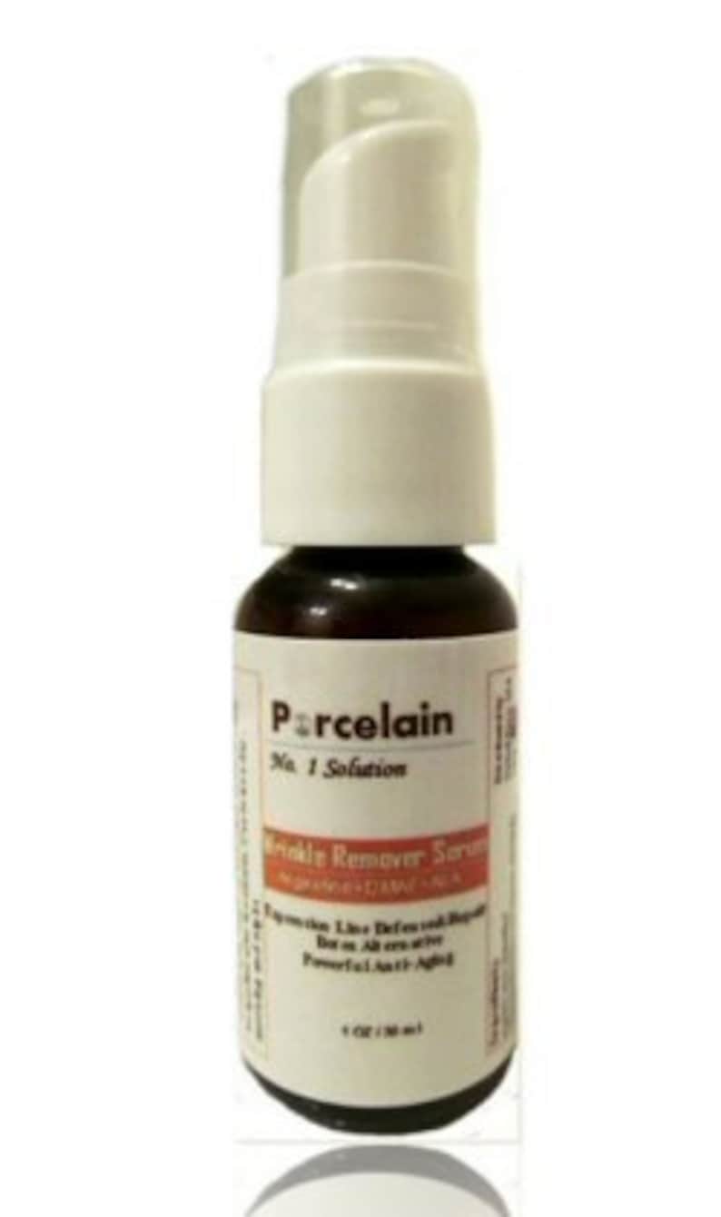 May include: A small brown bottle with a white pump top. The bottle is labeled "Porcelain No. 1 Solution Wrinkle Remover Serum Advanced Skin Care".