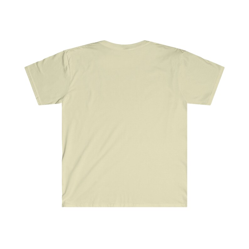 May include: A plain, light beige t-shirt with short sleeves.