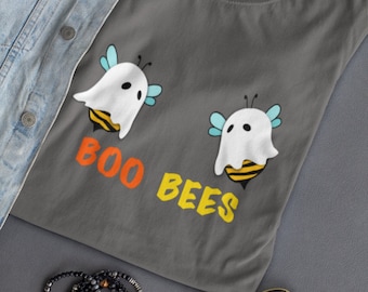 May include: A gray t-shirt with a graphic of two ghost bees and the text "BOO BEES" in orange and yellow.