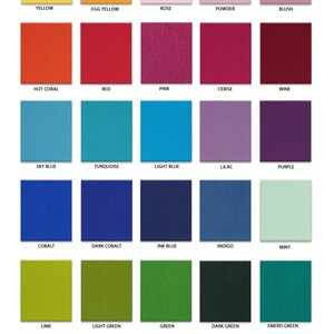 May include: A color chart featuring 25 fabric swatches in various shades, including yellow, red, blue, green, and neutral tones. The text "ORGANIC COTTON 100%" is at the top. Each swatch is labeled with its color name.
