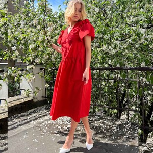 Red cotton dress| Oversize style dress| Romantic frill sleeve dress |V-neckline dress| Airy and voluminous dress| Dress with pockets|