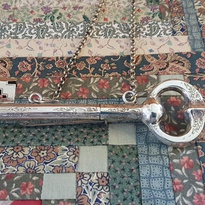 Antique silver knitting needle guards, key-shaped or chatelaine key, antique Dutch, 19th century